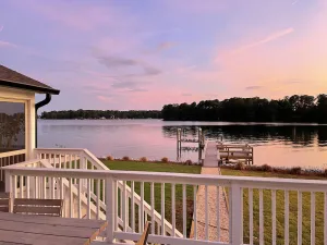 Image of Remodeled home on Lake Murray. Large screen porch overlooks large yard, and dock