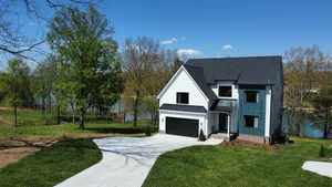 Image of Lakeshore Modern Brand new for 2023!  Lake front with platform dock and 2 kayaks