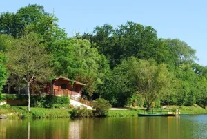 Image of Wooden cottage on the water