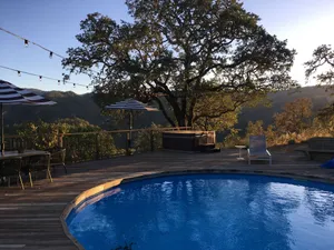 Image of Mountaintop open home living-pool, hot tub & views!