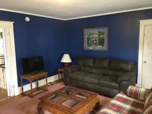Image of Spacious 2nd floor apartment steps from popular corner market.
