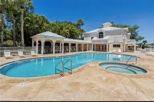 Image of GORGEOUS - LAKEFRONT CARRIAGE HOME-1ST FLOOR LIVING-2 BED\/2 BATH-2 POOLS