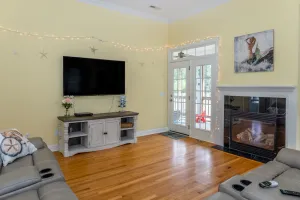 Image of Waterfront home near beach with screened porch, grill, fireplace, AC, & WiFi