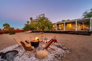 Image of ★Hot tub under the stars★ 3 King Beds, Desert Views, Fire Pit, Fast Wifi, Tesla