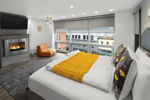 Image of Downtown Penthouse King Suite, Kitchenette, Free Breakfast, and Rooftop Hot Tub!