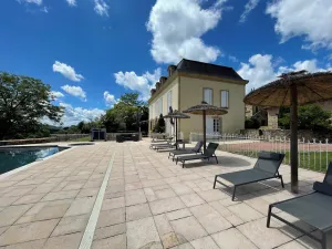 Image of Maison de maître with view of listed village
