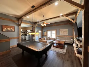 Image of 70\" TV, pool table, darts, 10 minutes from Wildlife Boat Ramp + Board & Batten
