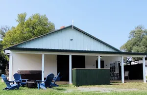 Image of Cowboy hide-a-way cottage with hot tub on historic farm close to everything