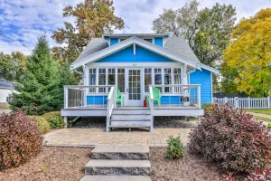 Image of Charming lakefront home with shared dock, porch, & sunroom - walk downtown