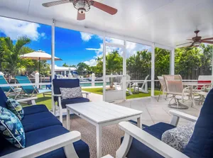Image of Keeper Cottage. Canal, Pool Club. Private backyard, XL Screen Porch. 37 ft Dock