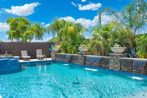 Image of New 4 BR Brand new Heated Pool & Spa plus 2nd therapeutic Spa! & Putting Green!