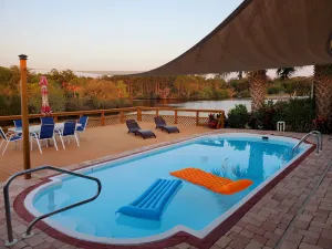 Image of 3BR Waterfront Oasis w\/ Private Solar Heated Pool and Spacious Deck