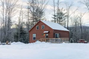 Image of Rosewood Villa: Lakefront Log Cabin Retreat