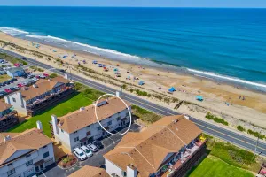 Image of Beachfront condo W\/ Shared pool, hot tub, sweeping views, foosball & private W\/D