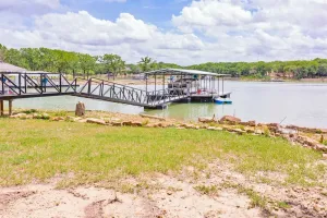 Image of Family lake front home with dock, kayak, outdoor kitchen and more