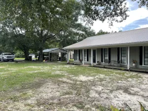 Image of Farmhouse charm + Bunkhouse. Fishing. Hot tub. Outdoor TV.