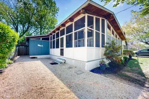 Image of Dog-friendly home with screened in porch, enclosed backyard, gas grill, & deck