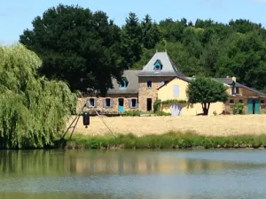 Image of Farmhouse in the woods, on a lake shore