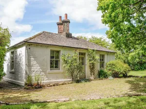 Image of A beautiful country cottage set in large gardens on the banks of the River Annan.