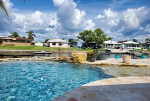 Image of Gulf of Mexico Canal Cottage with Boat Dock