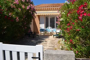 Image of Charming cottage in a residence with swimming pool.
