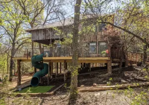 Image of "Magical Treehouse" w spiral slide off the deck 350 acres on the Brazos River! Tubing! Petting Zoo!