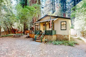 Image of Classic cabin steps to river, beach - private hot tub & fireplace - dog-friendly