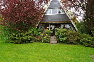 Image of Tent roof house for the whole family - - with forest view and fiber optics