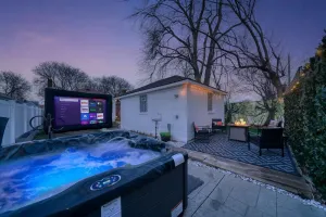 Image of Hot tub + Luxury cozy home + Fire pit + Game Room + Pool Table