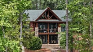 Image of Luxury log home on main lake - pizza oven, fire pit, kayaks, SUP, pontoon