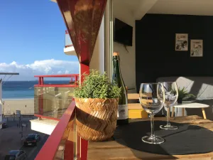 Image of Ideal location for beach and pink granite coast. Sea view from the balcony