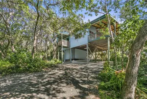Image of Beach House set amongst the trees and short walk to all amenities.