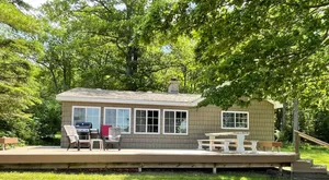 Image of Hubbard Lake Sunset Hideaway, large lakefront property.