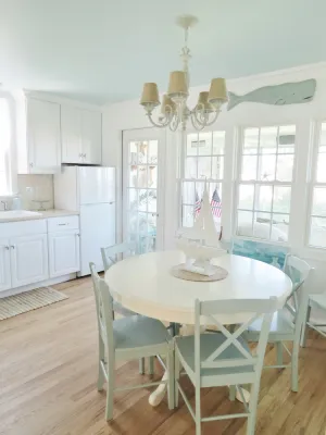 Image of Lake Front Cottage Home with Second Story Balcony Double Lot
