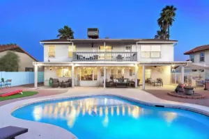 Image of Fun-filled, modern home with game room, heated pool, hot tub, grill