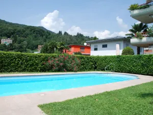 Image of Beautiful apartment for 4 people with WIFI, pool, TV, patio, pets allowed and parking