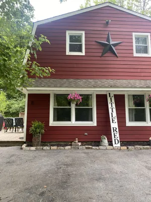 Image of Quaint country house nestled in the woods
