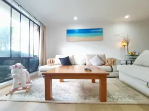 Image of Cheerful 4-bedroom home with natural backyard