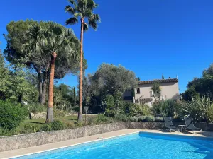 Image of Beautiful villa with spectacular pool, gardens and views