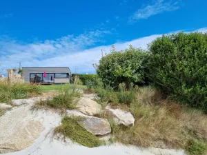 Image of Tresseny, 5 beds , feet in the water with direct access to the beach .