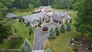 Image of Pickleball\/Basketball 11 BR 6.5 BA Sauna HotTub Pool Table\nFREE Tesla EV Charger