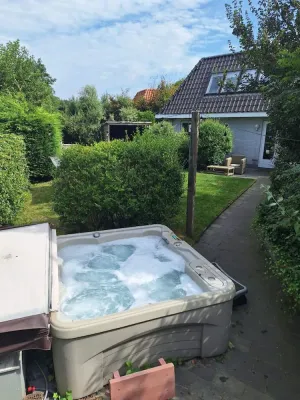 Image of Holiday Home de witte raaf with garden and hottub