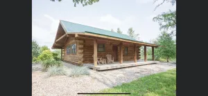 Image of Secluded log cabin at the end of a quiet dead end lane