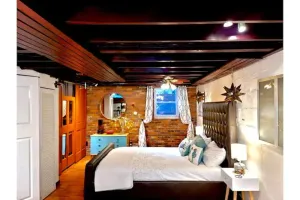 Image of Live in this iconic East Side lower level unit