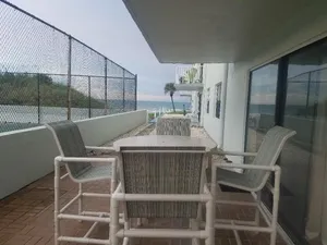 Image of Easy access ground floor unit close to parking lot, conveniently located to all NSB has to offer