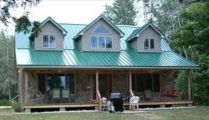 Image of Beautiful Lakefront Home with Pontoon on S. Manistique Lake