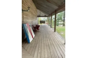 Image of Cabin in the woods overlooking Grenada lake.
