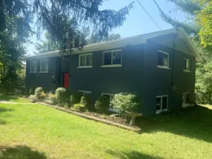 Image of Beautiful home Among trees outside the city