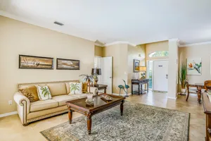 Image of Spacious home with screened-in pool & lush lakefront views - minutes to beaches