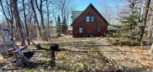 Image of A family cabin inside the woods
